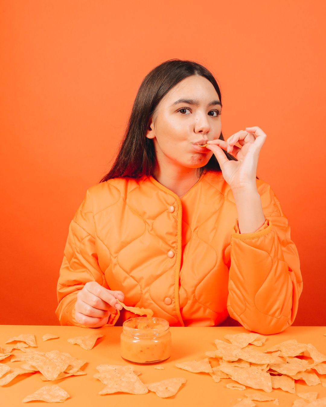 girl wearing orange